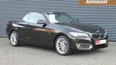 Zwart Gebruikt 2015 BMW 220 Luxury Line Cabriolet | € 15.950 (Eerlijke prijs)