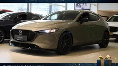 Bruin (metallic) Nieuw 2025 Mazda 3 Homura-Line Hatchback | € 34.300 (Goede deal)