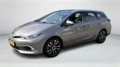 Bruin Gebruikt 2016 Toyota Auris Hybrid Executive Stationwagen | € 14.900 (Eerlijke prijs)