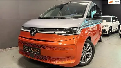 Oranje Occasion 2022 VW Multivan Energetic Van | € 44.950 (Eerlijke prijs)