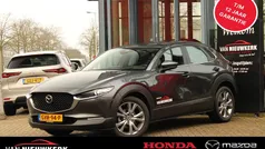 Machine grey (grijs mica) Gebruikt 2024 Mazda CX-30 Exclusive-Line SUV | € 31.400 (Eerlijke prijs)