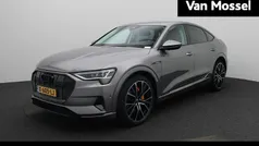 Grijs Gebruikt 2020 Audi e-tron Business SUV | € 30.900 (Eerlijke prijs)