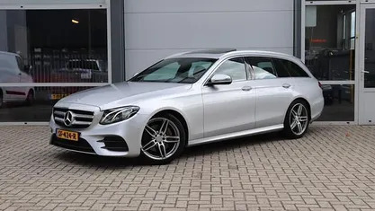 Grijs Gebruikt 2017 Mercedes E220 Business Stationwagen | € 19.950 (Eerlijke prijs)