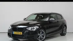 Zwart Gebruikt 2013 BMW M135 Comfort Edition Hatchback | € 21.450 (Eerlijke prijs)