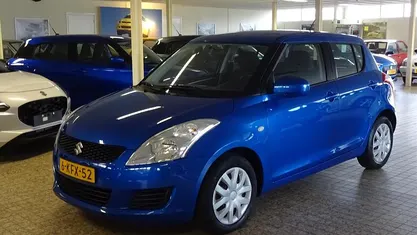 Blauw (metallic) Gebruikt 2013 Suzuki Swift Comfort Hatchback | € 7.950 (Eerlijke prijs)