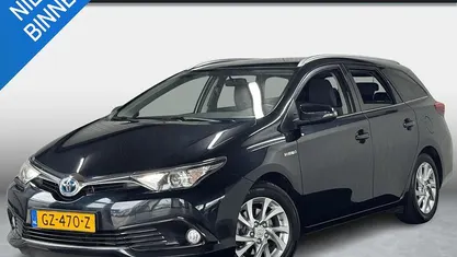 Grijs Gebruikt 2015 Toyota Auris Hybrid Trend Stationwagen | € 12.450 (Eerlijke prijs)