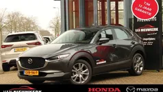 Machine grey (grijs mica) Gebruikt 2024 Mazda CX-30 Exclusive-Line SUV | € 34.890 (Eerlijke prijs)