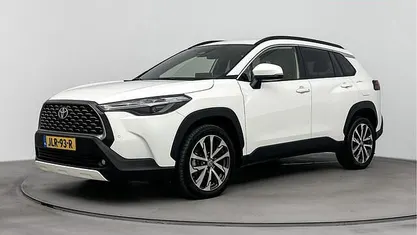 Licht wit Gebruikt 2024 Toyota Corolla Cross Style SUV | € 34.445 (Eerlijke prijs)