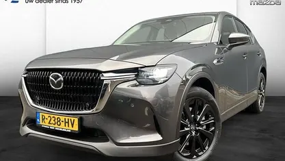 Machine grey (grijs metallic) Gebruikt 2022 Mazda CX-60 Exclusive-Line SUV | € 36.950 (Eerlijke prijs)