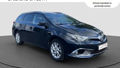 Grijs Gebruikt 2016 Toyota Auris Hybrid Stationwagen | € 15.795 (Eerlijke prijs)