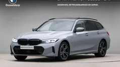 Grijs Gebruikt 2024 BMW 330e M Sport Stationwagen | € 48.950 (Super prijs)