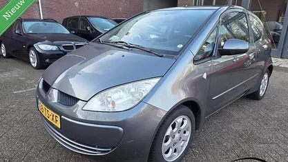 Grijs Occasion 2007 Mitsubishi Colt Hatchback | € 1.899 (Eerlijke prijs)