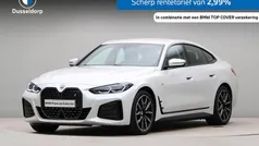 Wit, metallic lak Gebruikt 2022 BMW i4 Executive Sedan | € 41.950 (Eerlijke prijs)