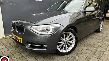 Grijs Gebruikt 2012 BMW 114 Sport Line Hatchback | € 6.950 (Eerlijke prijs)
