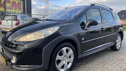 Zwart (metallic) Gebruikt 2008 Peugeot 207 Outdoor Outdoor Stationwagen | € 2.249 (Eerlijke prijs)