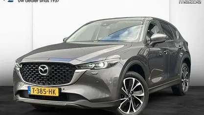 Machine grey (grijs metallic) Gebruikt 2023 Mazda CX-5 Ad'Vantage SUV | € 34.950 (Eerlijke prijs)