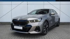 Grijs Gebruikt 2024 BMW 550e M Sport Sedan | € 89.950 (Goede deal)