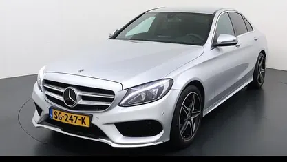 Zilver (metallic) Gebruikt 2018 Mercedes C180 AMG line Sedan | € 24.950 (Eerlijke prijs)
