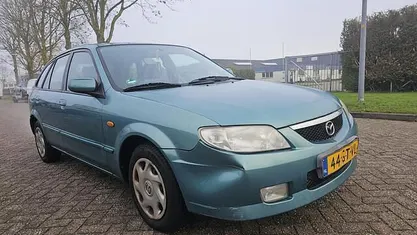 Groen Occasion 2001 Mazda 323 Hatchback | € 499 (Eerlijke prijs)