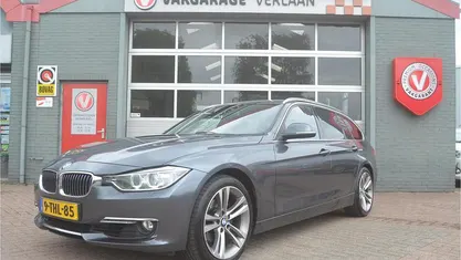 Grijs Occasion 2014 BMW 320 Executive Stationwagen | € 12.950 (Eerlijke prijs)