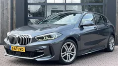 Grijs, metallic lak Gebruikt 2020 BMW 118 Executive Hatchback | € 21.950 (Goede deal)