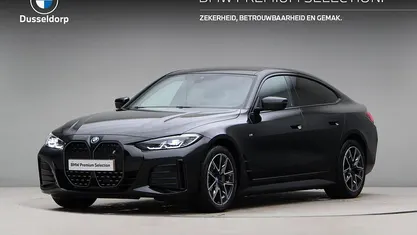 Zwart Gebruikt 2024 BMW i4 Executive Sedan | € 51.950 (Eerlijke prijs)
