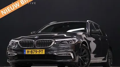 Grijs Gebruikt 2020 BMW 520 Executive Stationwagen | € 27.740 (Eerlijke prijs)