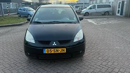 Occasion Mitsubishi Colt 95 PK (69 kW) 2006 Zwart Hatchback