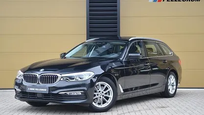 Zwart (metallic) Occasion 2018 BMW 520 Executive Stationwagen | € 20.950 (Goede deal)