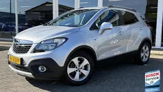 Grijs, metallic lak Gebruikt 2015 Opel Mokka Cosmo SUV | € 10.950 (Eerlijke prijs)