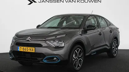 Grijs Gebruikt 2023 Citroën e-C4 Feel Sedan | € 20.445 (Eerlijke prijs)