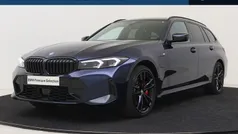 Blauw Gebruikt 2024 BMW 330e Executive Stationwagen | € 53.850 (Goede deal)