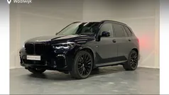 Carbonschwarz (donker zwart metallic) Gebruikt 2021 BMW X5 Executive SUV | € 61.880 (Eerlijke prijs)