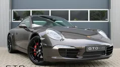 Bruin, metallic lak Gebruikt 2012 Porsche 911 Carrera S Coupé | € 79.950 (Eerlijke prijs)