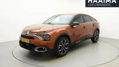 Oranje Gebruikt 2021 Citroën e-C4 Shine SUV | € 18.950 (Eerlijke prijs)