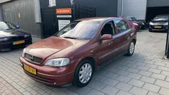 Rood, metallic lak Gebruikt 2000 Opel Astra Hatchback | € 1.499 (Eerlijke prijs)