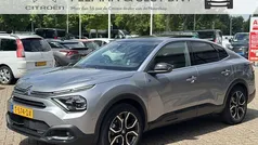 Grijs Gebruikt 2023 Citroën e-C4 Shine Sedan | € 19.950 (Eerlijke prijs)