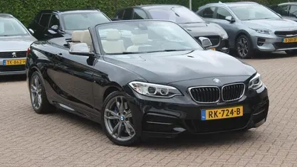 Zwart Gebruikt 2017 BMW M240 Executive Cabriolet | € 33.950 (Eerlijke prijs)