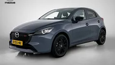 Machine grey (grijs metallic) Gebruikt 2023 Mazda 2 Homura-Line Hatchback | € 20.945 (Eerlijke prijs)