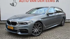 Grijs Gebruikt 2020 BMW 520 Executive Stationwagen | € 25.900 (Goede deal)