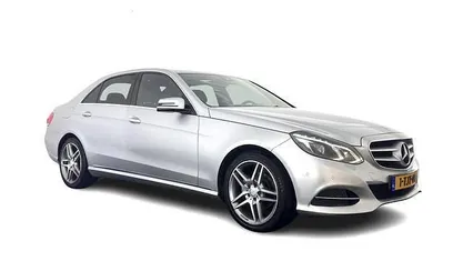 Grijs (metallic) Gebruikt 2014 Mercedes E200 Ambition Sedan | € 10.445 (Eerlijke prijs)