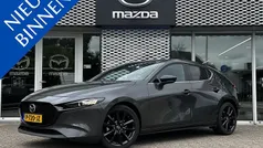 Machine gray Gebruikt 2022 Mazda 3 Sportive Hatchback | € 25.490 (Eerlijke prijs)