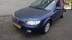Blauw (metallic) Gebruikt 2001 Mazda 323 Touring Hatchback | € 2.950 (Eerlijke prijs)