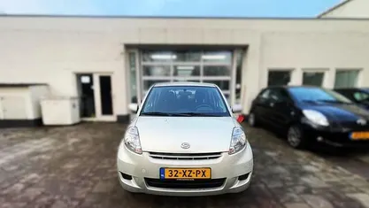 Occasion Daihatsu Sirion 69 PK (50 kW) 2007 Beige Hatchback