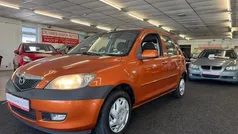 Oranje Gebruikt 2003 Mazda 2 Exclusive MPV | € 2.250 (Eerlijke prijs)