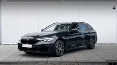 Zwart Gebruikt 2023 BMW 530e M Sport Stationwagen | € 51.900 (Eerlijke prijs)
