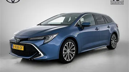 Blauw (metallic) Gebruikt 2020 Toyota Corolla Executive Stationwagen | € 24.945 (Eerlijke prijs)