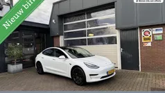 Wit (metallic) Gebruikt 2020 Tesla Model 3 Standard Range Sedan | € 19.950 (Eerlijke prijs)