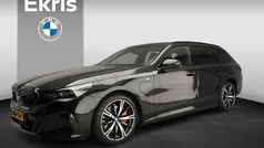 Gebruikt 2025 BMW 550e M Sport Stationwagen | € 87.900 (Eerlijke prijs)