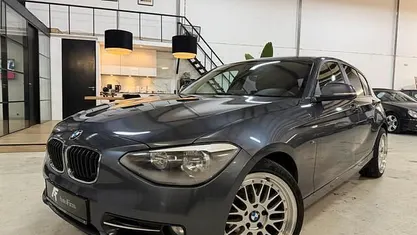 Grijs Gebruikt 2013 BMW 118 Sport Line Hatchback | € 8.245 (Goede deal)